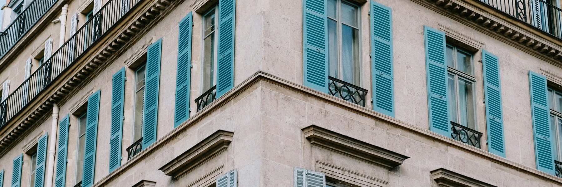 Keys to a new home in France being handed over on a sunny doorstep